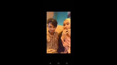 Young Boy Enjoying With His Hijabi GF In Restaurant