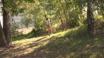 Ali B squats on a golf course to piss outside