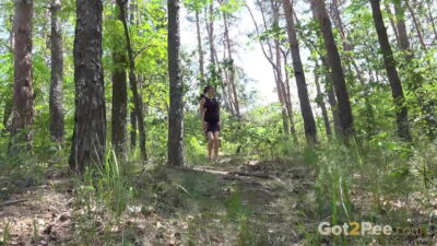 Ali Bordeaux relieves her pee desperation outside