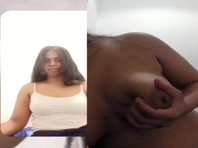 Chubby shy Indian girl showing round boobs to lover